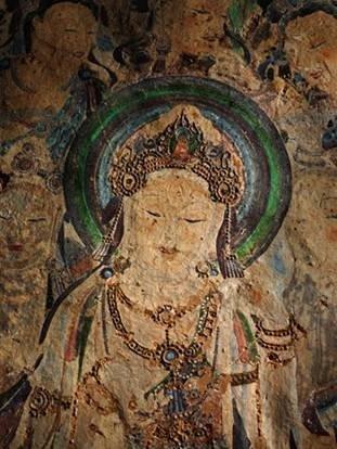 莫高窟第57窟，初唐時繪製的觀音菩薩像，法相莊嚴。（圖：敦煌研究院）