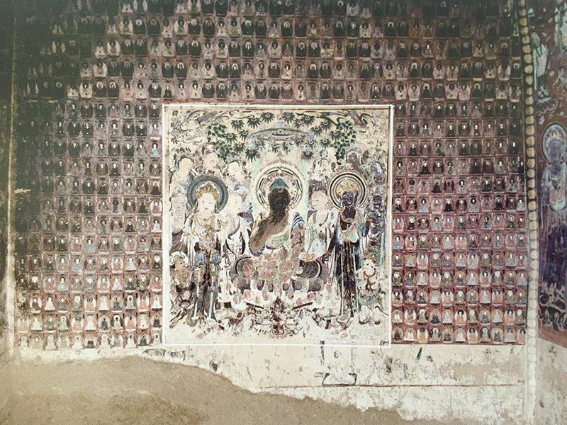 莫高窟第57窟南壁,中央畫阿彌陀佛說法圖,周圍繪千佛圖像。(圖:敦煌研究院)